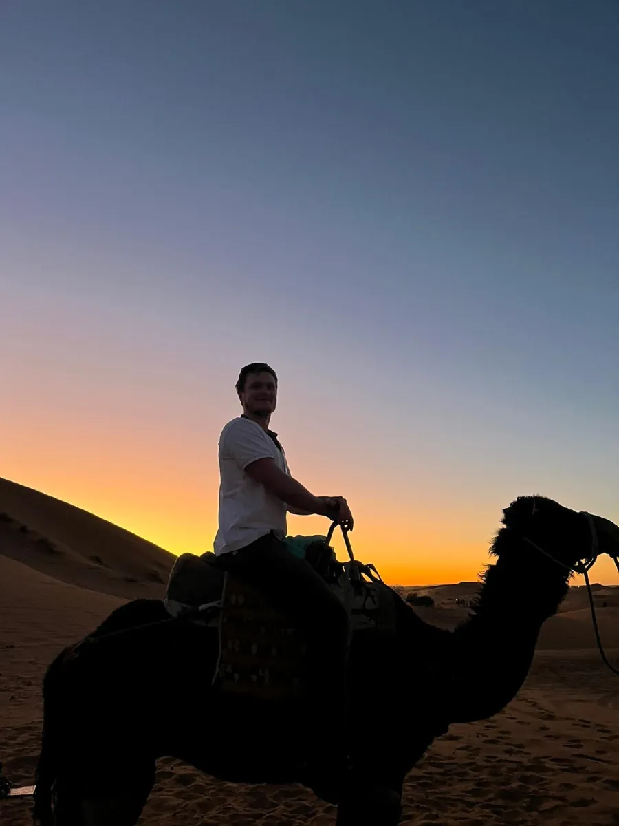 Photo of Gabriel Noel on a camel