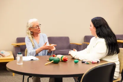 Profe Orf discussing with student