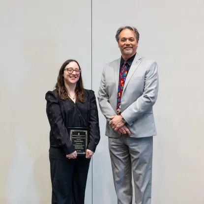 Sam Marier receiving award