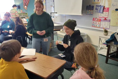 NMU French students teaching elementary students basic French