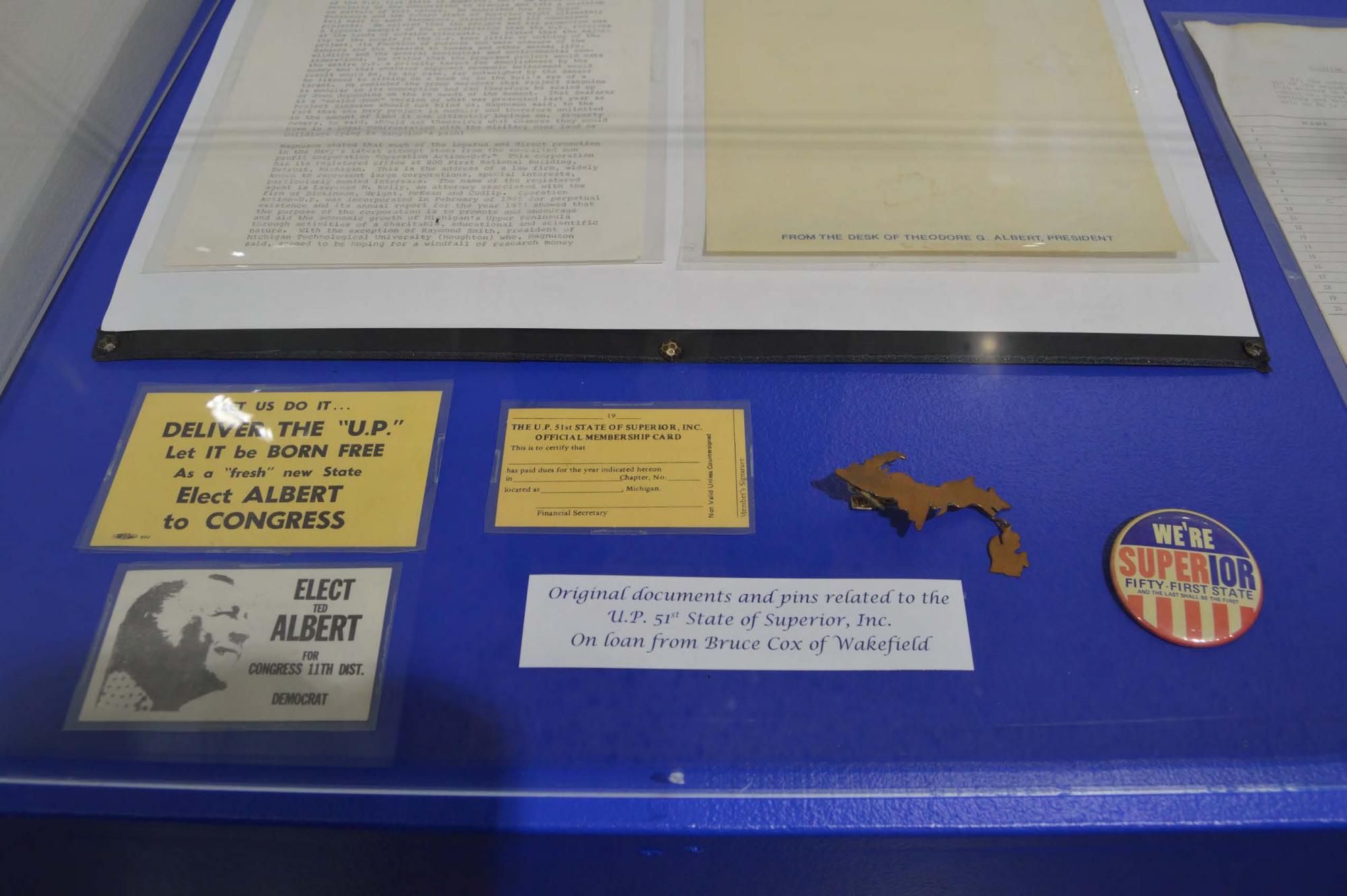 Documents and pins from U.P. 51st State of Superior