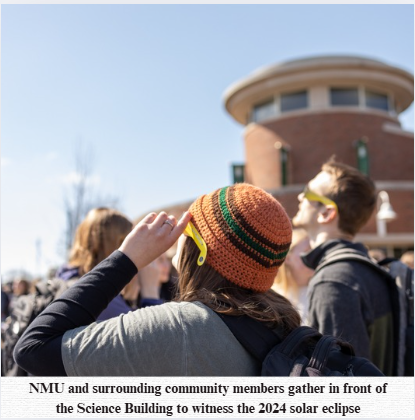 NMU stock photo of students watching the 2024 solar eclipse
