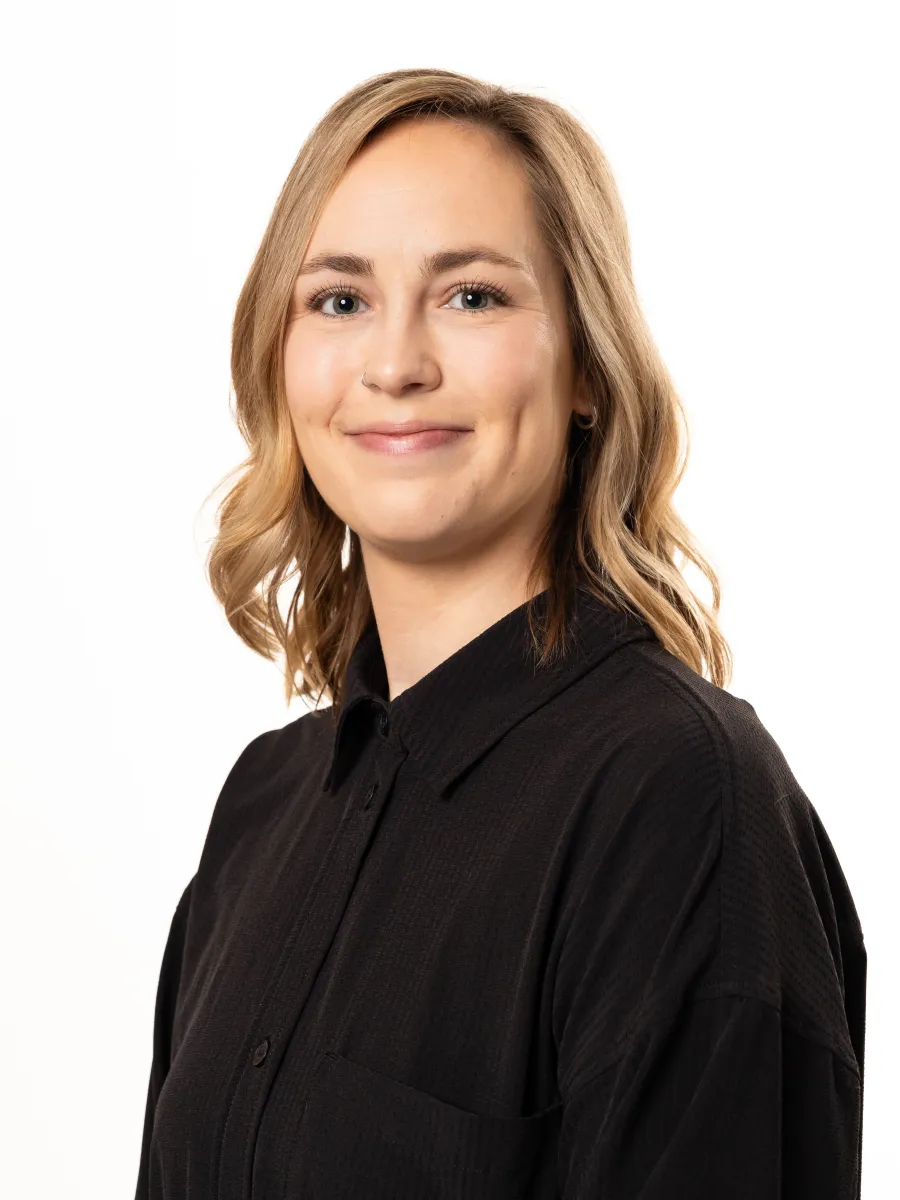 Professional headshot of Claire Jacques, printing services coordinator