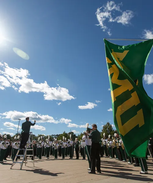 Marching Band with NMU flag