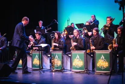 NMU Jazz Band performing on stage.