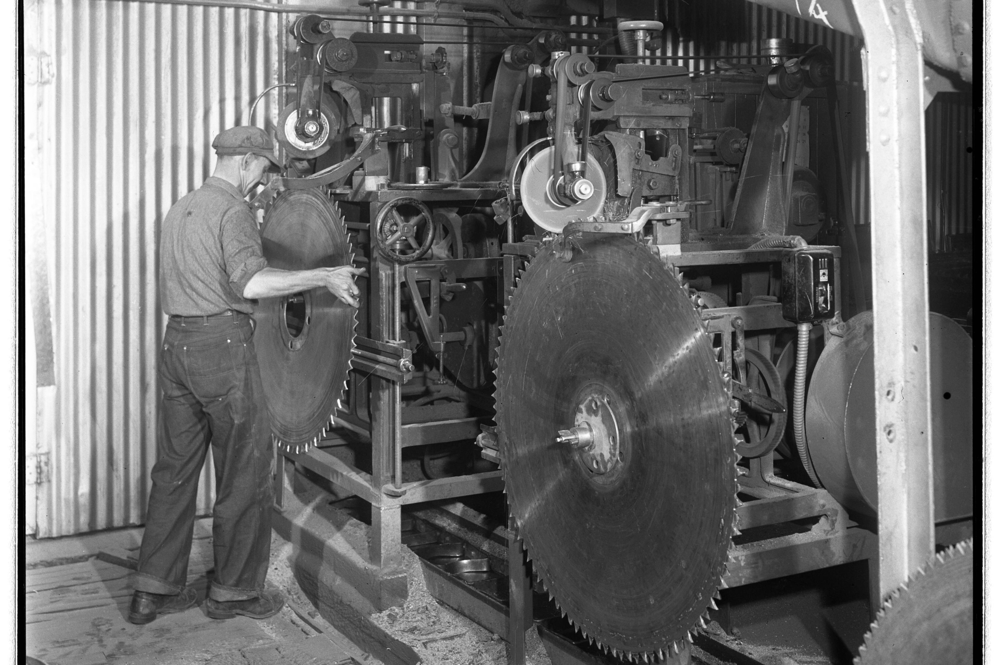 Working replacing saw blades at the Dow Sawmill