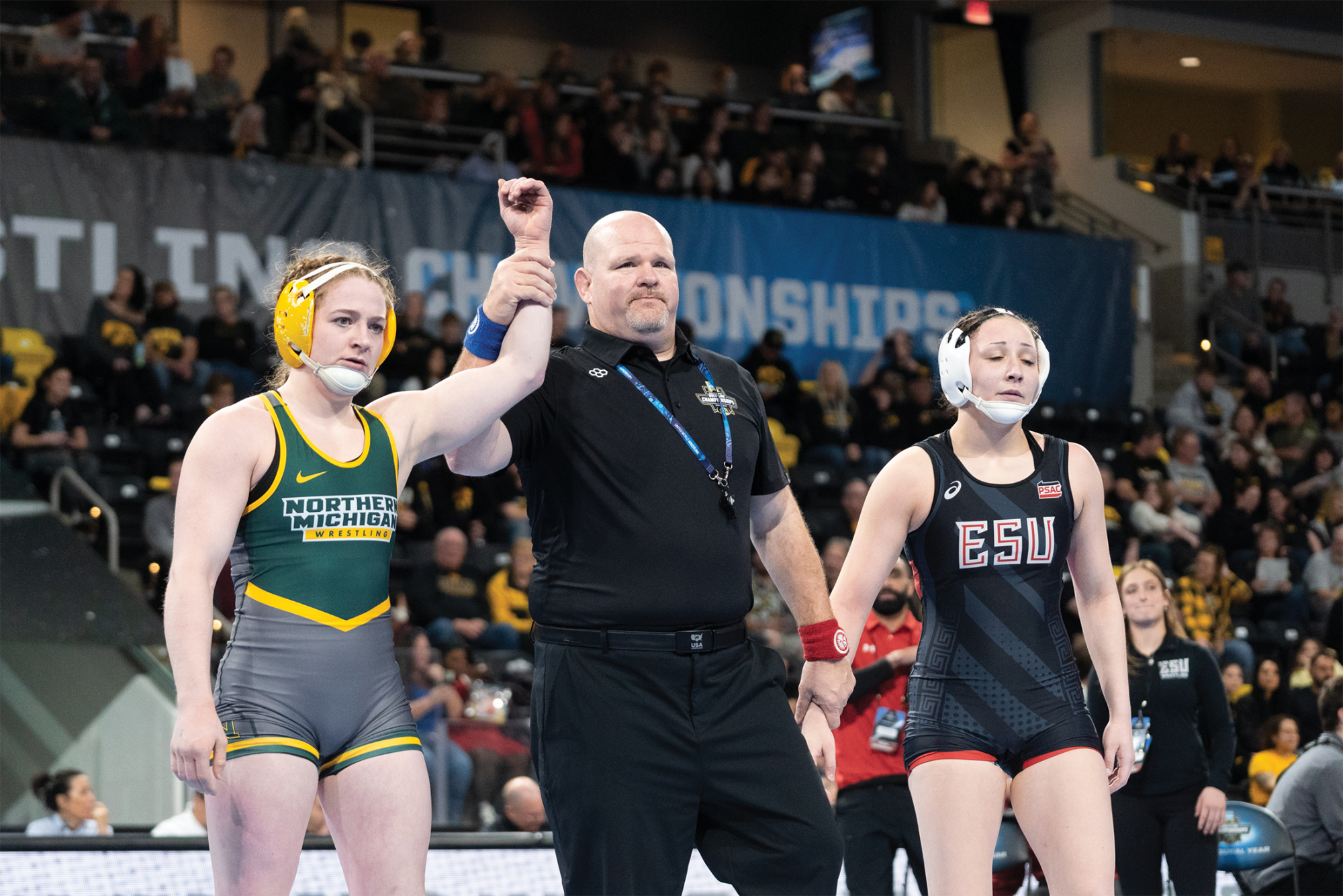 Alissa Caltagirone winning a wrestling match.