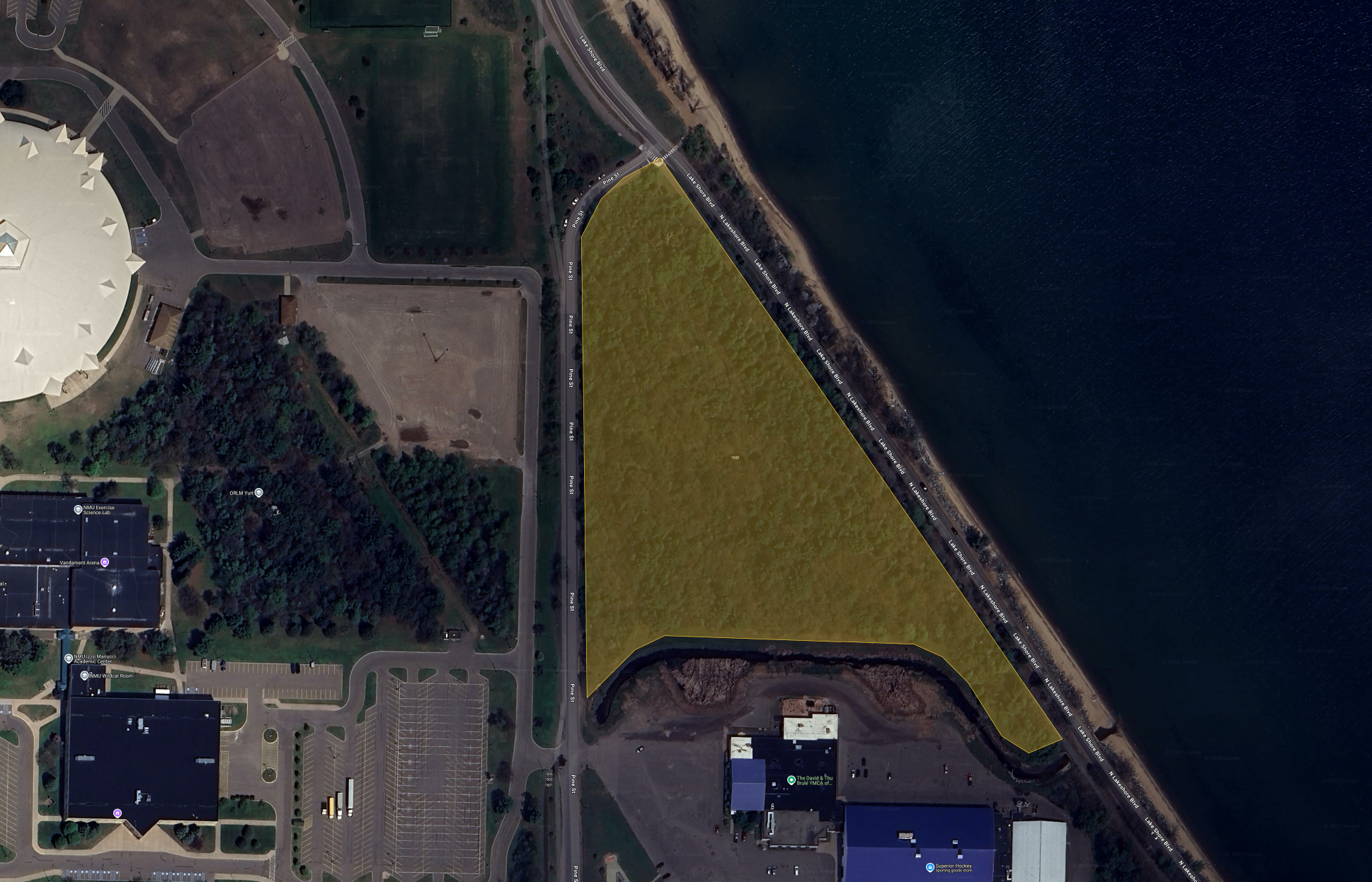 Aerial view of lakeshore near Superior Dome