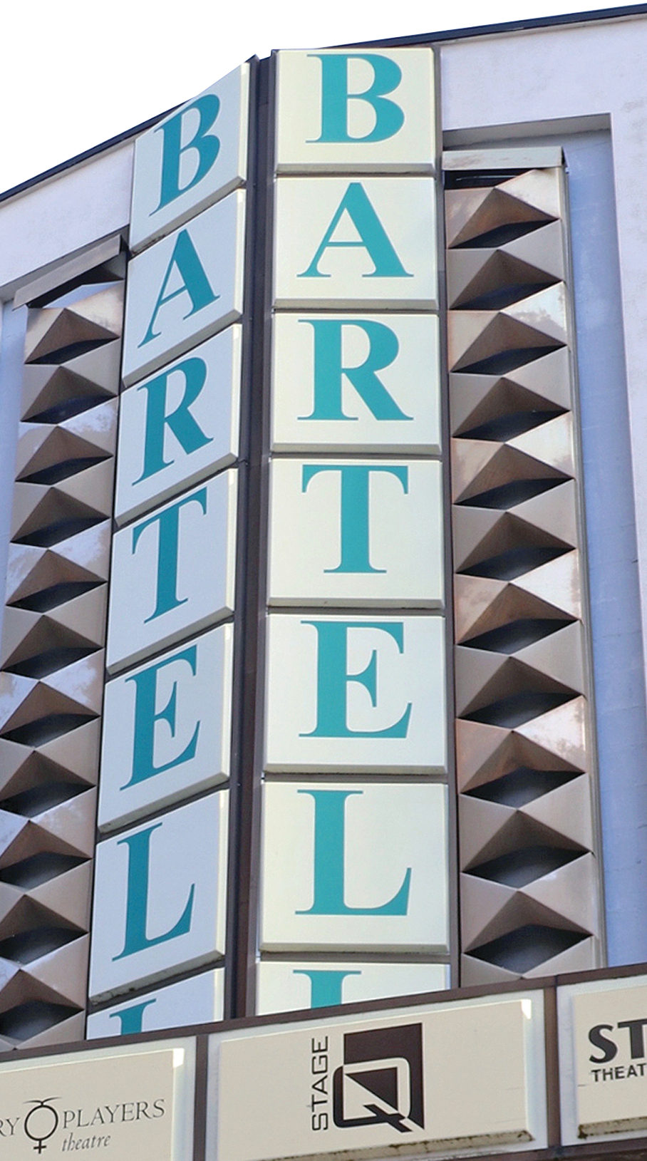 Building with a sign that reads "Bartell"