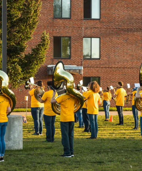 NMU's Marching Band in front of Spalding Hall
