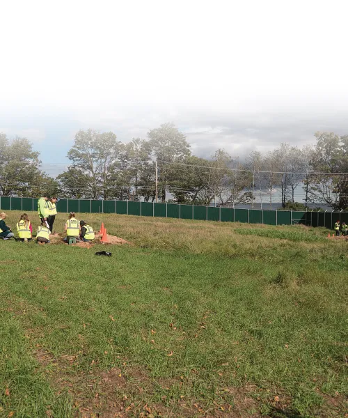 Earth, Environmental and Geographical Sciences Professor Matt Van Grinsven leads a soils class at the FROST facility.