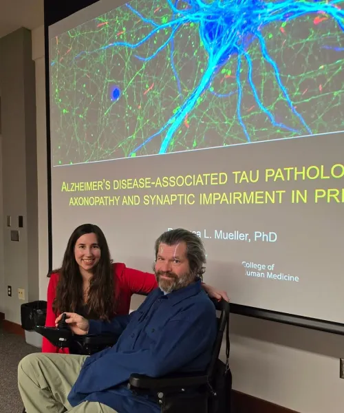 Mueller with NMU Professor Dr. Erich Ottem.