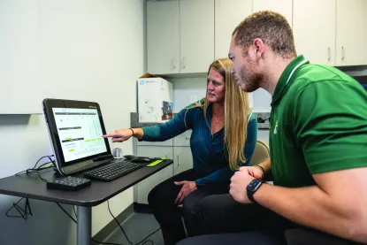 Dr. Maggie Moore and athletic training master's student Tyler Grant