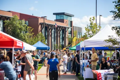 Students walking on NMU's academic mall.