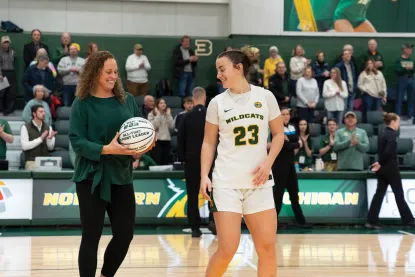 NMU women's basketball's Jacy Welsbrod being recognized for her record-setting career in three-pointers.