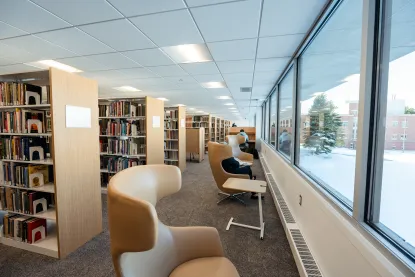 Bookshelves and desks inside of the newly renovated Harden Hall.