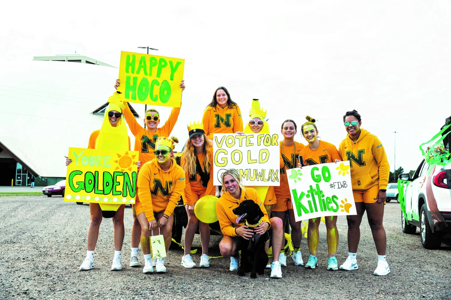 The NMU Women's Lacrosse team at the Homecoming parade