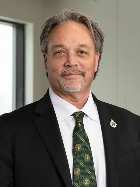 Chris Olsen, NMU President