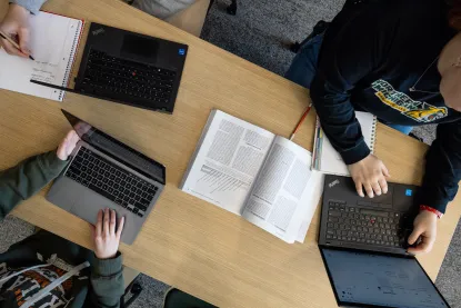 Open laptops on a desk
