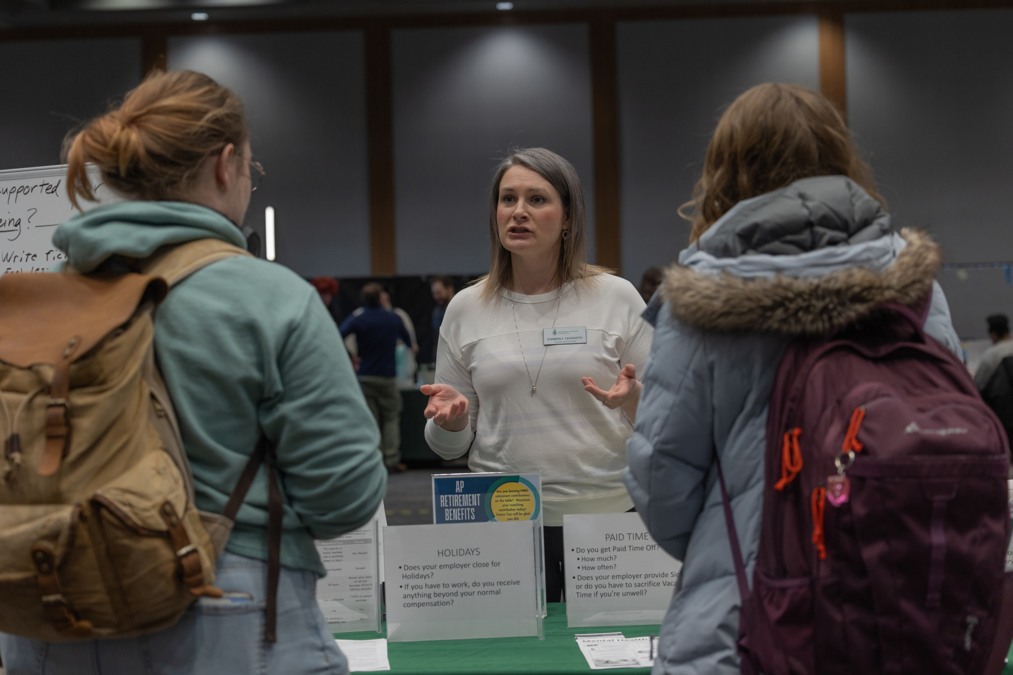 HR staff talking with students