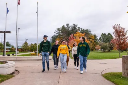 Students walking through the heart of NMU's campus