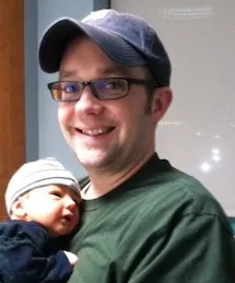 A photograph of Mike Brown with his child