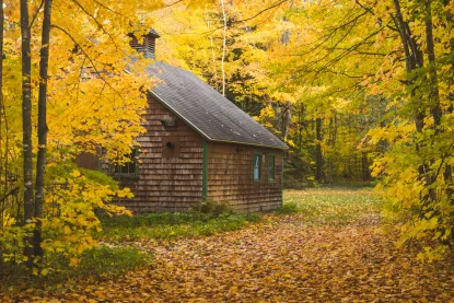 Cabin in autumn woods