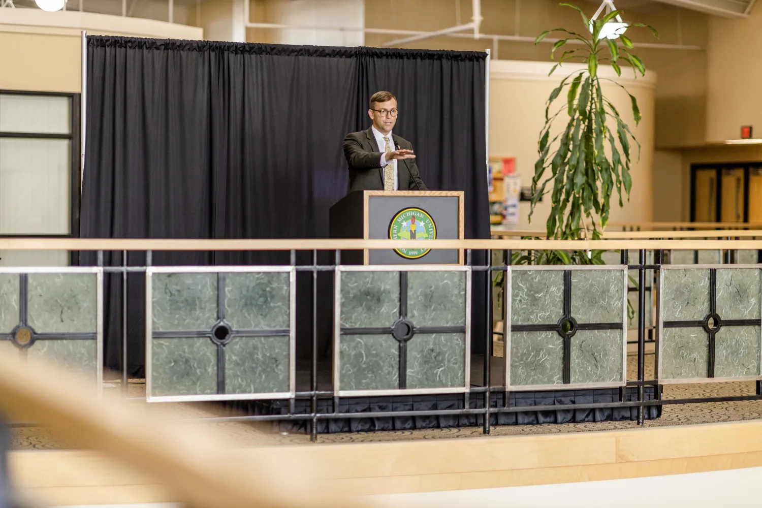 President Tessman speaking while standing at a podium