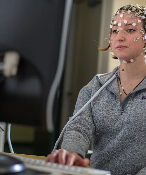 Student with sensors on her head
