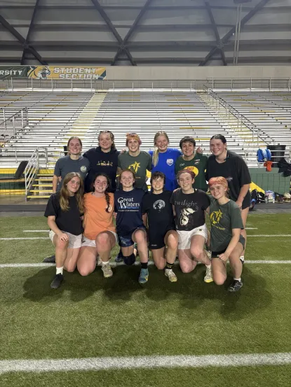 Group photo during practice in Superior Dome