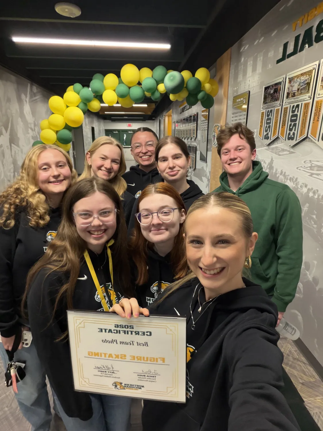 Team members posing with certificate at Club Sports Awards Night