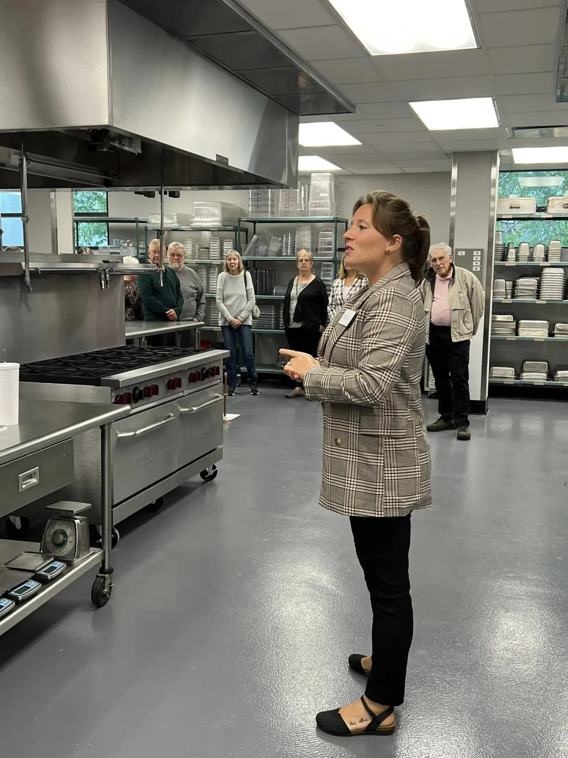 Loganne Glendenning, associate professor in Hospitality Management, giving a tour of the department's new culinary facilities in the Northern Center.