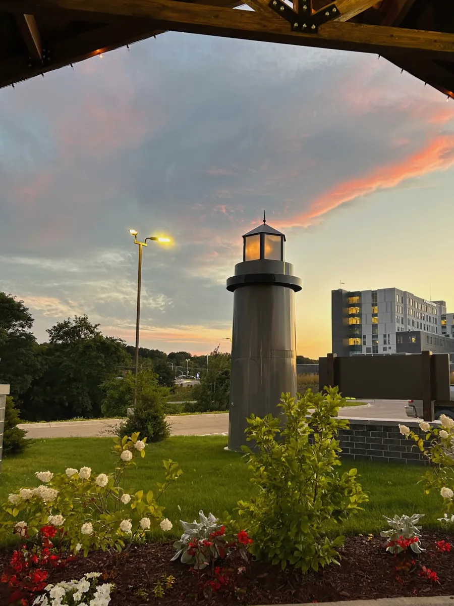 Beacon House light house in front of a sunset sky