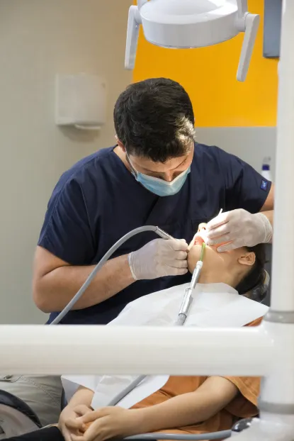 Hygienist Cleaning Teeth