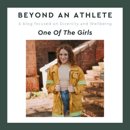 Image of Ruby wearing a firefighter jacket. The text reads "Beyond An Athlete: a blog focused on Diversity and Wellbeing: One Of The Girls"