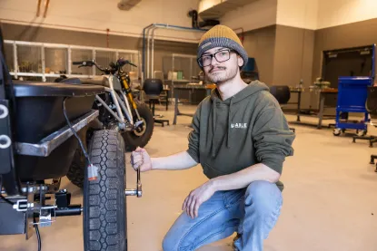 Josh Guinazzo Staged in front of wheel