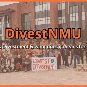 Students in front of Jamrich at DivestNMU rally. 