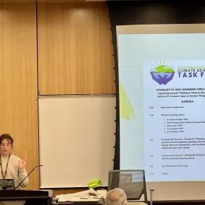 Student presenting at American Association of Geographers Conference