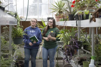 Students in green house