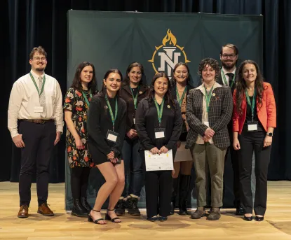 Grad presenters posing for a picture 