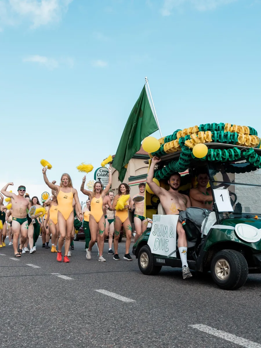 Swim and Dive in 2022 Homecoming Parade