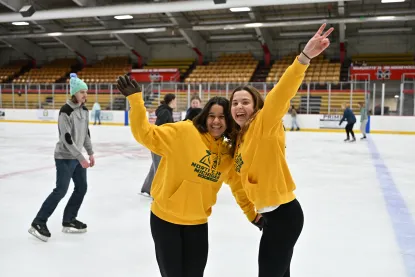 Students at an ice arena to skate