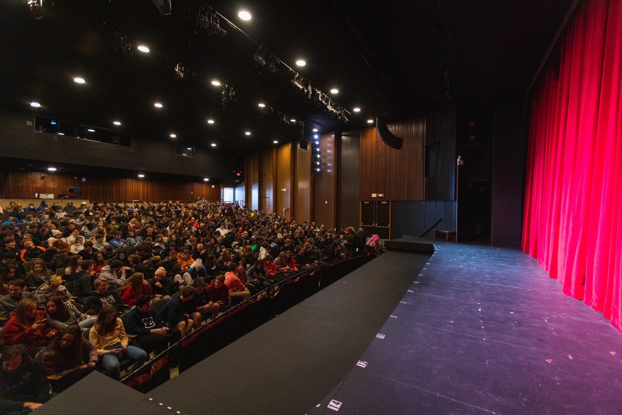 Looking out at audience from stage