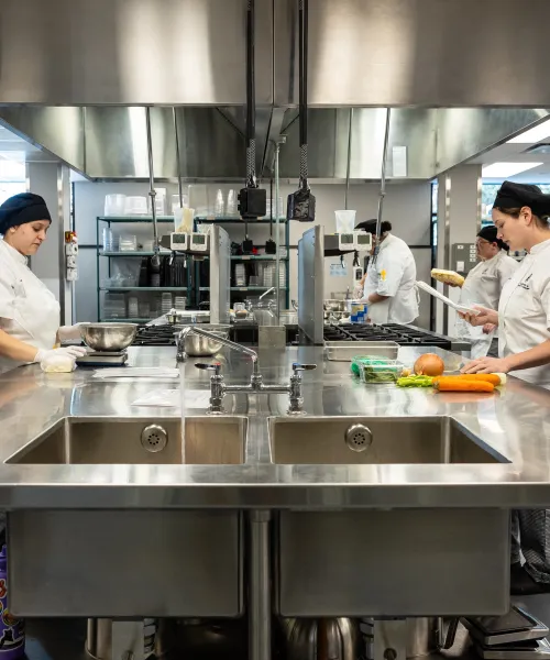 Students work in the industrial test kitchen.