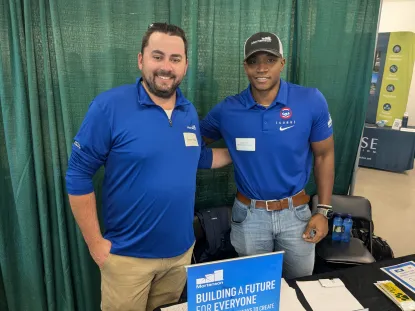 NMU CM Alumni recruiting for Mortenson at the career fair