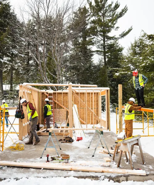 construction students working on a building