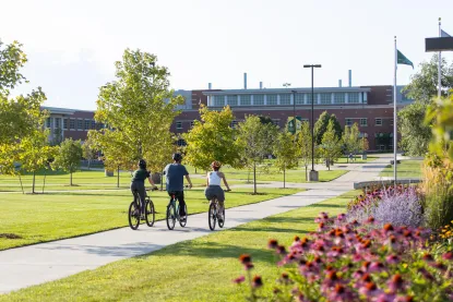 Students biking on campus