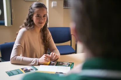 student with admissions counselor