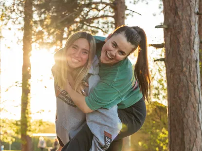 Piggy back ride in the sunlight